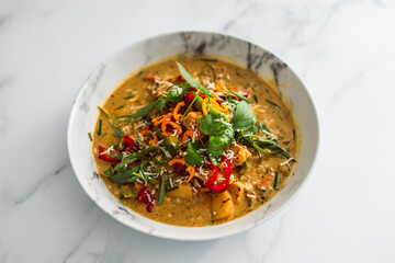 vegan thai vegetable curry with fresh chili and herbs, healthy plant-based food