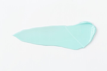 on a white background smeared with colored cream