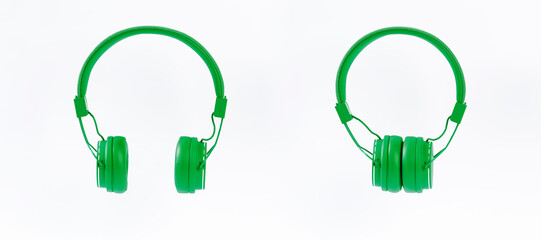 green headphones on a white background