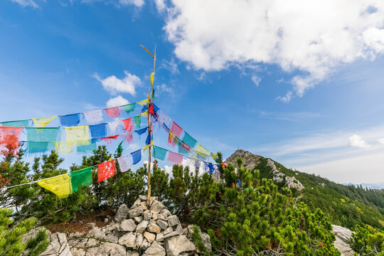 Colorful prayer flags hanging on summit of Aiplspitz mountain