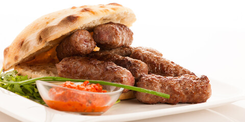 photo of Cevapi, cevapcici, traditional  Balkan food - delicius minced meat - banner size - 492520215