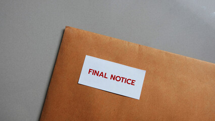 Final notice bills on wood background, Email concept.
