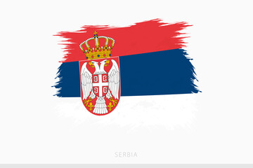 Fototapeta premium Grunge flag of Serbia, vector abstract grunge brushed flag of Serbia.