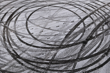 Abstract Car Drift Skid Marks In Winter Snow - 492527056