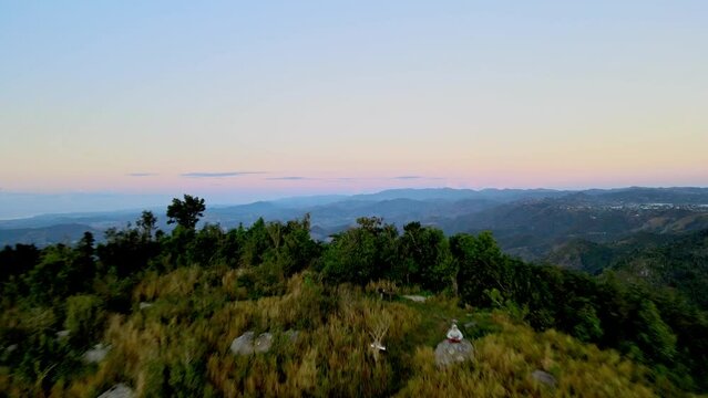 DRONE AERIAL SHOT IN MOUNTAINS DURING SUNSET
