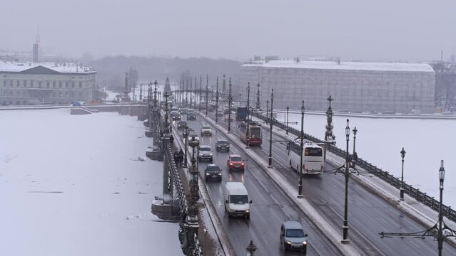 City traffic on the troitsky bridge winter time Saint Petersburg Russia 