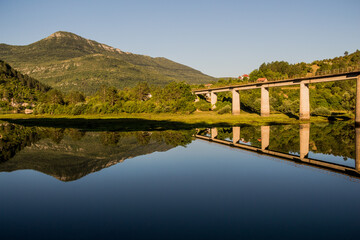 bridge over the lake with wonderful reflection