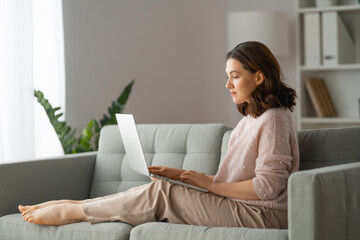 Fototapeta premium woman using laptop