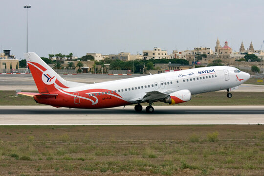 Luqa, Malta - September 24, 2008: Nayzak Airlines (Centralwings) Boeing 737-45D (Reg: SP-LLE) lifting off from runway 13.