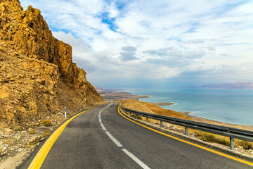The sea surface reflects the clouds