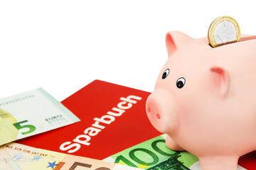 Sparbuch mit Euro Geldscheinen und rosa Sparschwein auf weissem Hintergrund