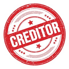 CREDITOR text on red round grungy stamp.