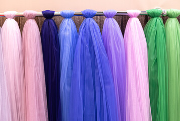 Fabric Delicate tulle fabrics of different shades. Wedding materials for dresses. Mesh, organza, chiffon colorfull. Copyspace