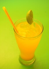 orange cocktail with lime
