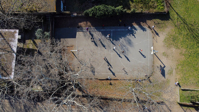 Suburban basketball court seen from the drone