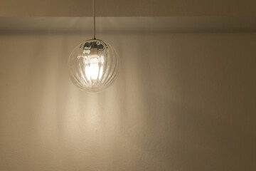 Beautiful modern ceiling lamp round shape glass decoration for home and living and wall background.