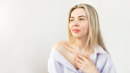 woman in a man's shirt.femininity.female collarbone.
Happiness sensual young woman in a light men's...