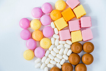 Sweet colorful confectionery, candy on the white background