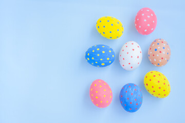 Colorful easter eggs on blue background