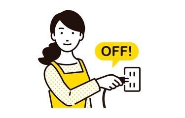 節電を考えてコンセントを抜く主婦