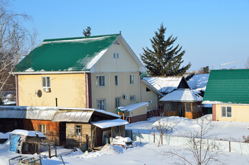 Arsenyev, Russia, January, 28, 2017. Village hause in the town of Arsenyev in clear weather, Primorsky Krai