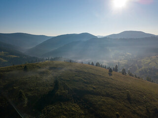 Obraz premium Ukrainian Carpathians mountains on a summer morning. Aerial drone view.