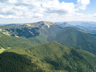 Obraz premium High mountains of the Ukrainian Carpathians in sunny weather. Aerial drone view.
