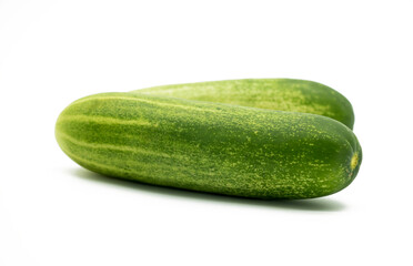 green cucumber in horizontally on white