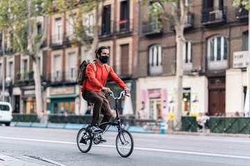 Cool Man Riding Bike in the Street