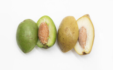 raw and boil olives with slices isolated on white background, top view