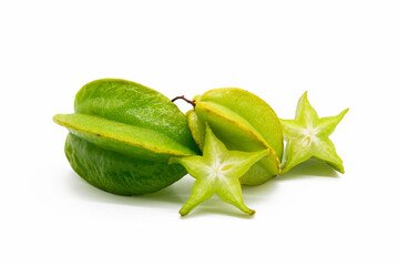 Fototapeta premium Fresh whole slices carambolas or Star fruit on white background