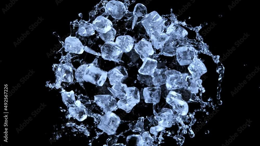 Aufkleber super slow motion of rotating ice cubes with splashing water, top view shot. filmed on high speed ci