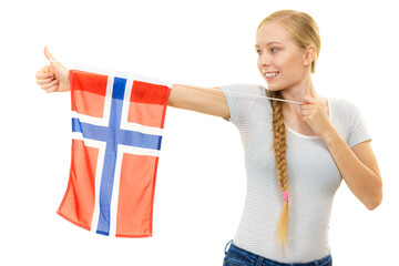 Young woman with norwegian flag