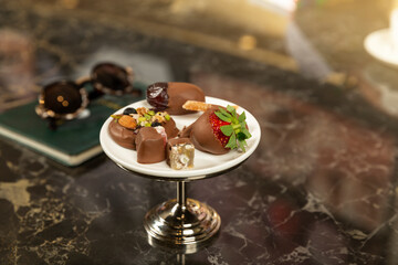Strawberry Turkish delight and chocolates on the plate