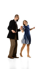 Couple of dancers, young man and woman in vintage retro style outfits dancing swing dance isolated...
