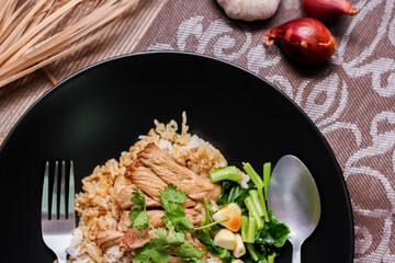 Stewed pork leg on rice, Thai food and street food that Thai people like to eat. or what we call 
