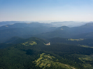 High mountains of the Ukrainian Carpathians in cloudy weather. Aerial drone view.