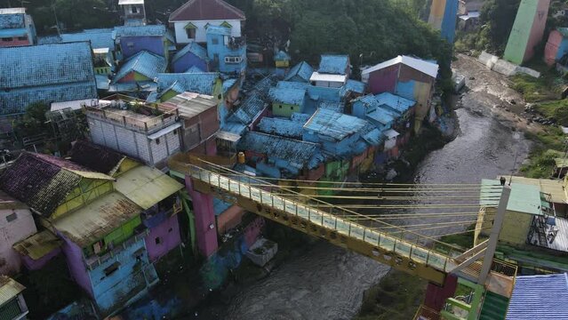 Aerial view of the colorful village of Jodipan, Malang city. A unique village tourist destination, colorful houses.