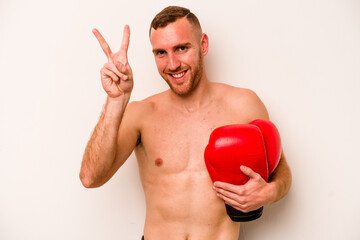 Young caucasian man doing boxing isolated on white background showing number two with fingers.