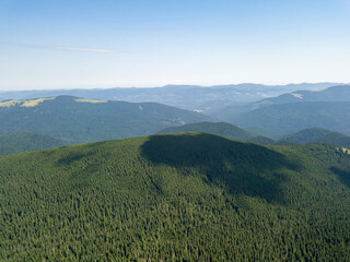 High mountains of the Ukrainian Carpathians in cloudy weather. Aerial drone view.