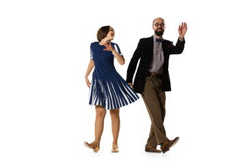 Couple of dancers, young man and woman in vintage retro style outfits dancing swing dance isolated...