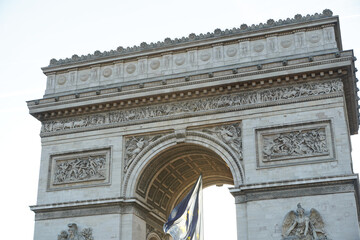 Fototapeta na wymiar Arch of Triumph building from Paris, France, during a beautiful spring sunrise. Photo taken from Champs Elysee boulevard. Landmarks of France. photo outside.