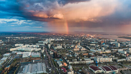 Fototapeta na wymiar Khabarovsk city top view sunset beautiful clouds in the rain
