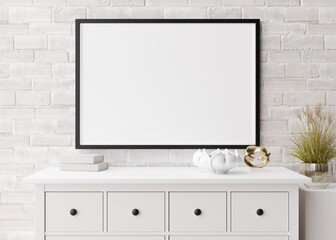 Empty horizontal picture frame on white brick wall in modern living room. Mock up interior in minimalist, scandinavian style. Free, copy space for picture, poster. Console, sculptures. 3D rendering.