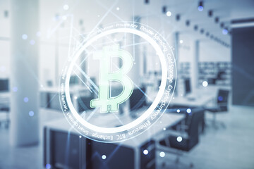 Double exposure of creative Bitcoin symbol hologram on modern corporate office background. Cryptocurrency concept