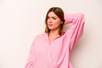 Obraz premium Young caucasian woman isolated on white background tired and very sleepy keeping hand on head.