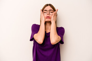 Young caucasian woman isolated on white background whining and crying disconsolately.