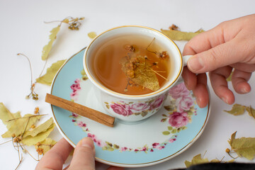 Influenza, acute respiratory infections. Tea from dried linden flowers as an alternative method of treating colds. Copy space. Folk treatment.