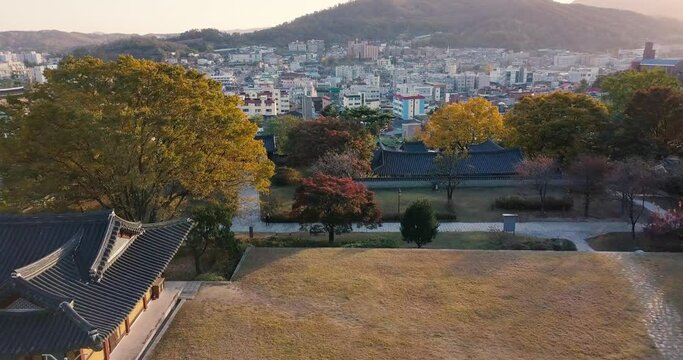 Incheon, South Korea 14 December 2020 Goryeo Palace Site, Ganghwa. Aerial drone view of Palace site and colorful maple tree at sunset..