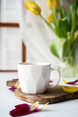 white mug on the kitchen table, festive breakfast